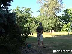 Old and young enjoy outdoor threesome with horny granny