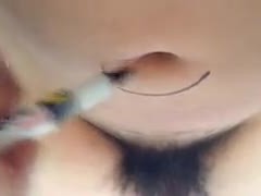 Amateur hairy lady gets off with cucumber in softcore video