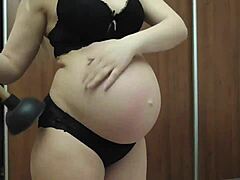 Horny mom with a belly to match indulges in solo play
