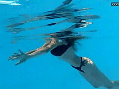 European babe Bonnie dolce in tight bikini swims in public