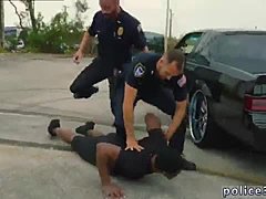 Gay porn features a muscular cop masturbating and having sex with young men