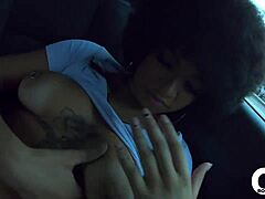 Latina babe with tattoos and big ass in solo car masturbation