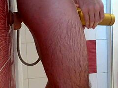 Solo guy enjoys masturbating in the shower